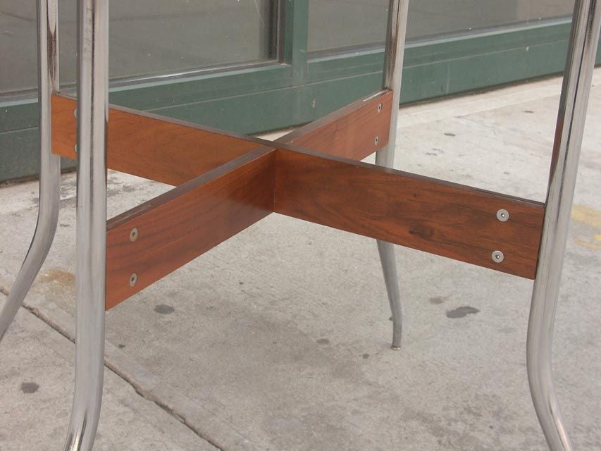 George Nelson designed a group of furniture for the University of Colorado in the 1960's, manufactured by Herman Miller. 20 of these tables were fabricated for a dining hall. utilizing Nelson's 