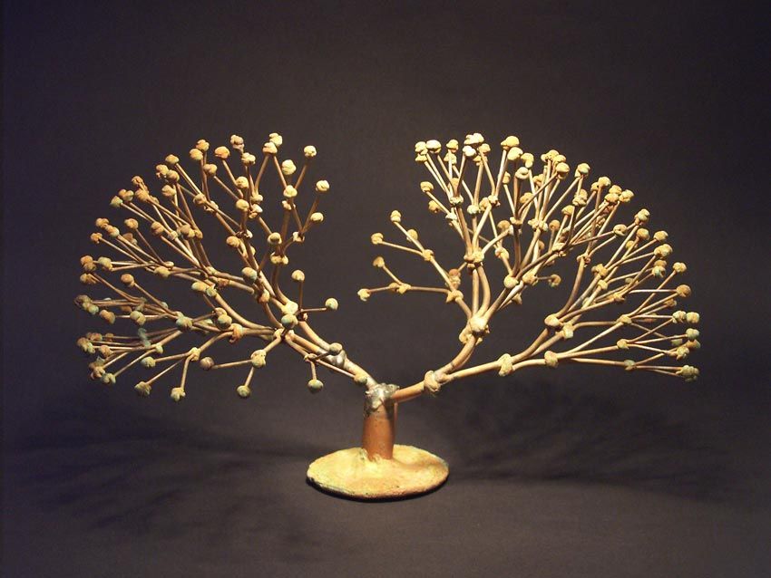 Thought to be one of Bertoia's earliest explorations of his celebrated bush sculpture form. A copper tube is pinched to form the center stem, to which a pair of branches extend, and subdivide in threes, to create the beautiful floral form. Many of