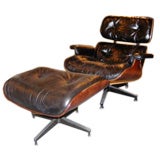 Rosewood Lounge Chair with Ottoman by Charles 
Ray Eames