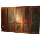 set of five antique teak wood doors from a food shop