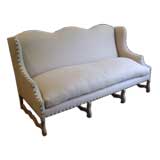 Antique Upholstered Wingback Sofa