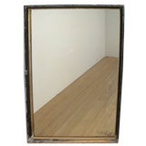 Ebonized and Gilt Wood Framed Mirror
