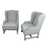 pair of oak upholstered os de mouton armchairs