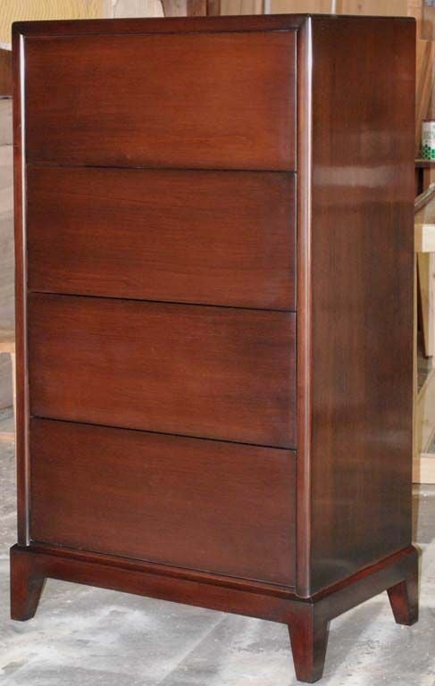 Highboy with four drawers in alder, dark walnut stain and premium satin lacquer finish.

The simple and clean look is achieved by using state of the art hardware that remains invisible. Push to open, push to close! Pulls are optional.

This piece is