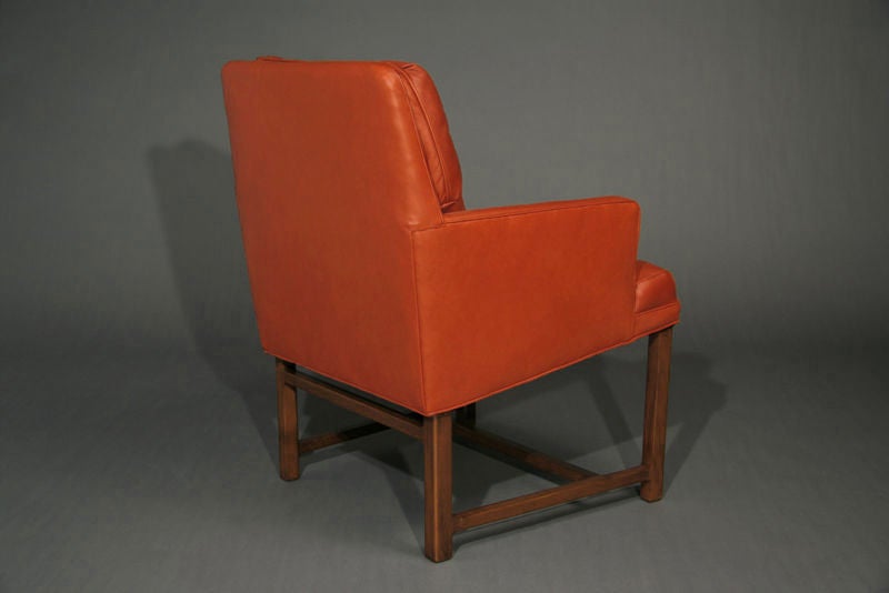 Pair of mahogany and brick red leather arm chairs by Dunbar 3