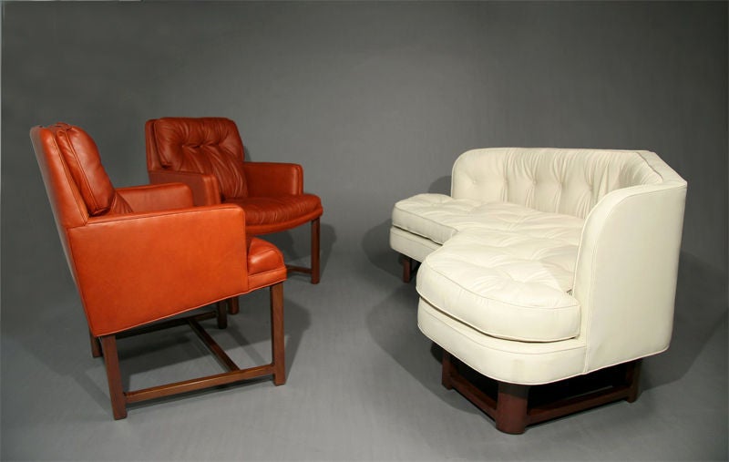Pair of mahogany and brick red leather arm chairs by Dunbar 4