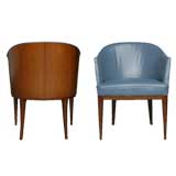 Pair of blue leather and exotic wood barrel chairs