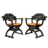 Pair of colonial style carved elephant head chairs
