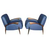 Pair of leather and rosewood lounge chairs by Scapinelli