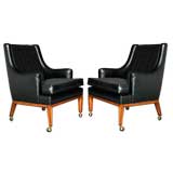Pair of leather and velvet arm chairs by Monteverdi-Young