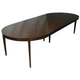 Long oval mahogany dining table by Edward Wormley for Dunbar