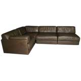 Brown leather sectional sleeper sofa by De Sede