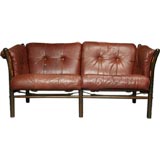 Red Leather Safari settee by Arne Norell