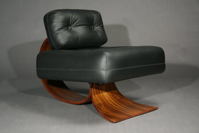 Leather and rosewood chair and ottoman by Oscar Niemeyer 1