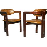 Pair of embossed leather and exotic wood "Pamplona" chairs