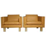 Pair of square Danish camel leather and oak arm chairs