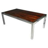 Gorgeous rosewood and polished aluminum dining table