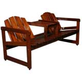 Peroba wood slat settee with attached table by Sergio Rodrigues