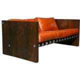 Rosewood & orange leather sling settee