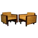 Pair of rosewood and leather arm chairs by Fatima Architects