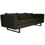 Vintage Dark brown sofa with walnut base