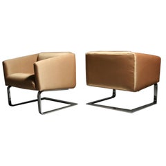 Pair of silk and chrome cantilevered lounge chairs