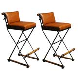Pair of caramel leather bar stools by Cleo Baldon