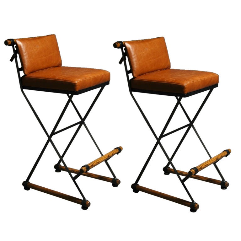 Pair of caramel leather bar stools by Cleo Baldon