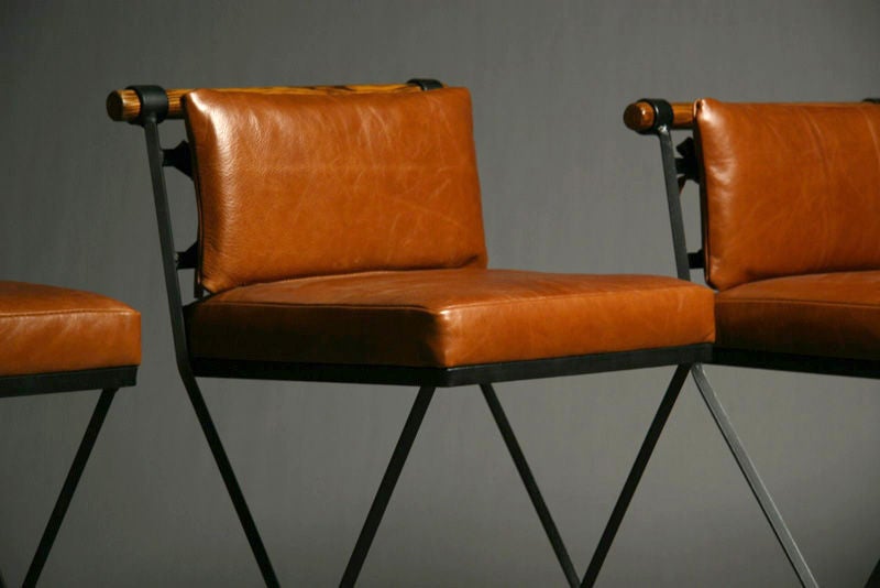American Pair of caramel leather bar stools by Cleo Baldon