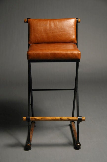Mid-20th Century Pair of caramel leather bar stools by Cleo Baldon