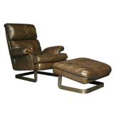 Brown leather and bronze lounge chair & ottoman by Metropolitan