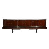 Spectacular rosewood and polished brass credenza