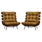 Two Martin Eisler leather and chrome base bone chairs
