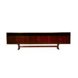 A long rosewood and black lacquer credenza