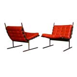 Pair of bronze frame red leather lounge chairs by L'Atelier
