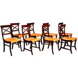 A Set of eight Klismos style rosewood dining chairs