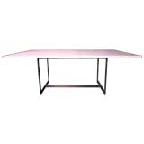 A Bronze base and cararra marble top dining table