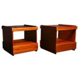 Pair of rolling glass top side tables by Sergio Rodrigues