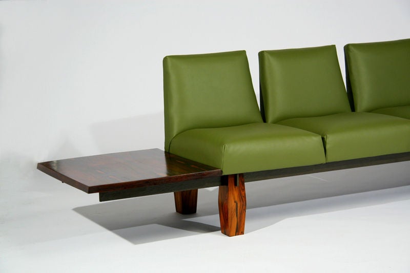 Rosewood and green leather sofa with floating ends by L'Atelier