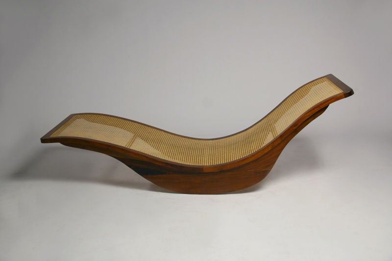 A rocking wood and caned chaise longue by Igor Rodrigues 1