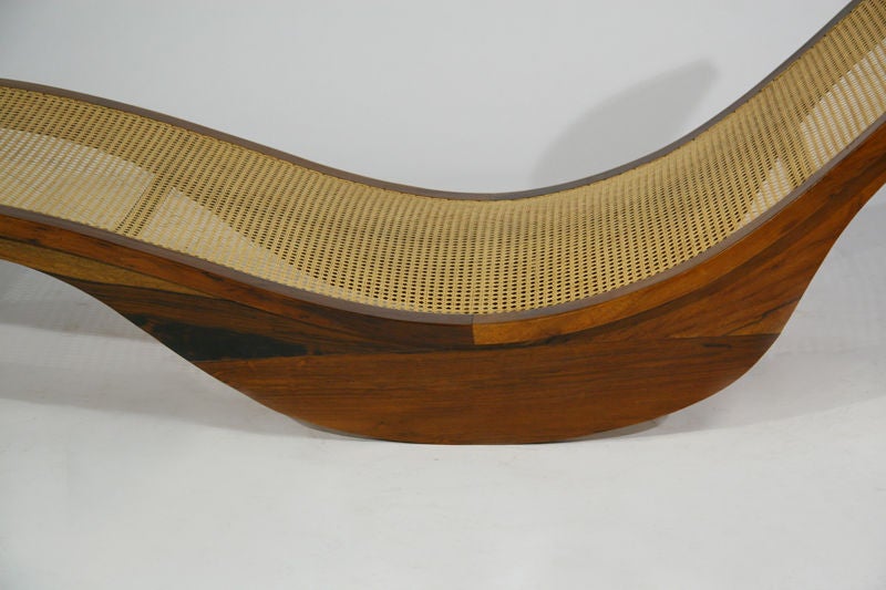 A rocking wood and caned chaise longue by Igor Rodrigues 2