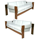 Pair of Metropolitan white leather and walnut sofas