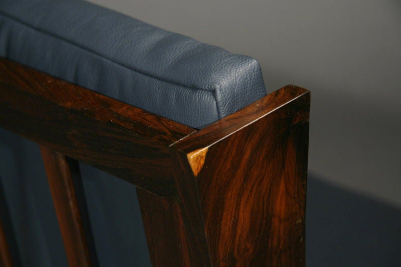 Leather Brazilian rosewood and leather cushion slat back sofa