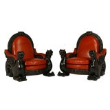 A pair of Devil headed arm chairs from a Portuguese fasienda