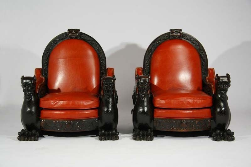 This beautifully carved pair of devil or gargoyle chairs was acquired from a Portuguese fasienda (estate/farm).  These chairs are believed to be Gothic Revival from the early 1900's. We would think they were made even earlier but for the fact they