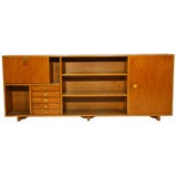 A shallow exotic wood cabinet by Jose Zanine Caldas