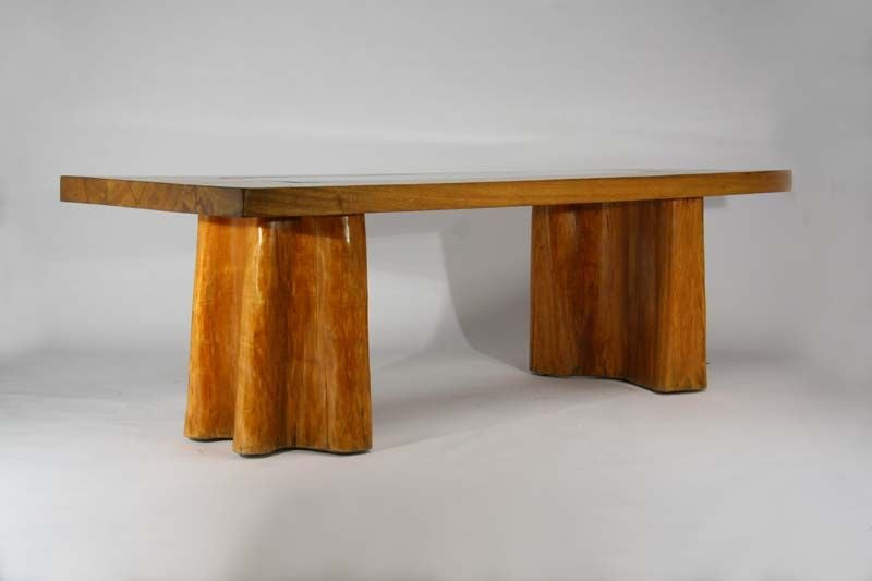 This dining table embodies the naturalistic qualities of Zanine's work of the 1970's and 80's, whereby he made use of reclaimed exotic woods to create unique and commanding original works.