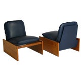 Pair of Brazilian exotic wood and blue leather lounge chairs