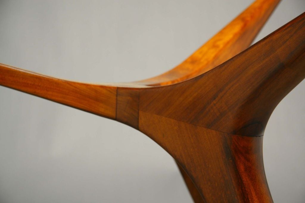 Mid-20th Century Sculpted exotic wood and glass dining table by Scapinelli