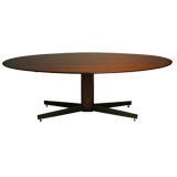 Oval rosewood dining table by Jorge Zalszupin